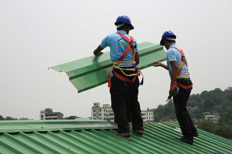 Roofing-Maintenance-DynaRoof-installing-rooftop