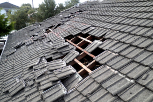 broken -punctured -gray-tile-roof