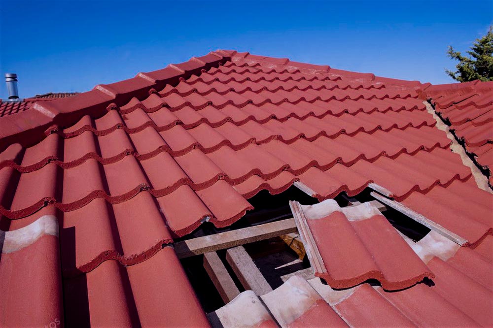 roof-punctured-red-brick-colored-tiled-roof